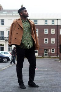Men's camouflage/military shirt with a camel Peacoat, black chinos & lace up plimsolls shoes