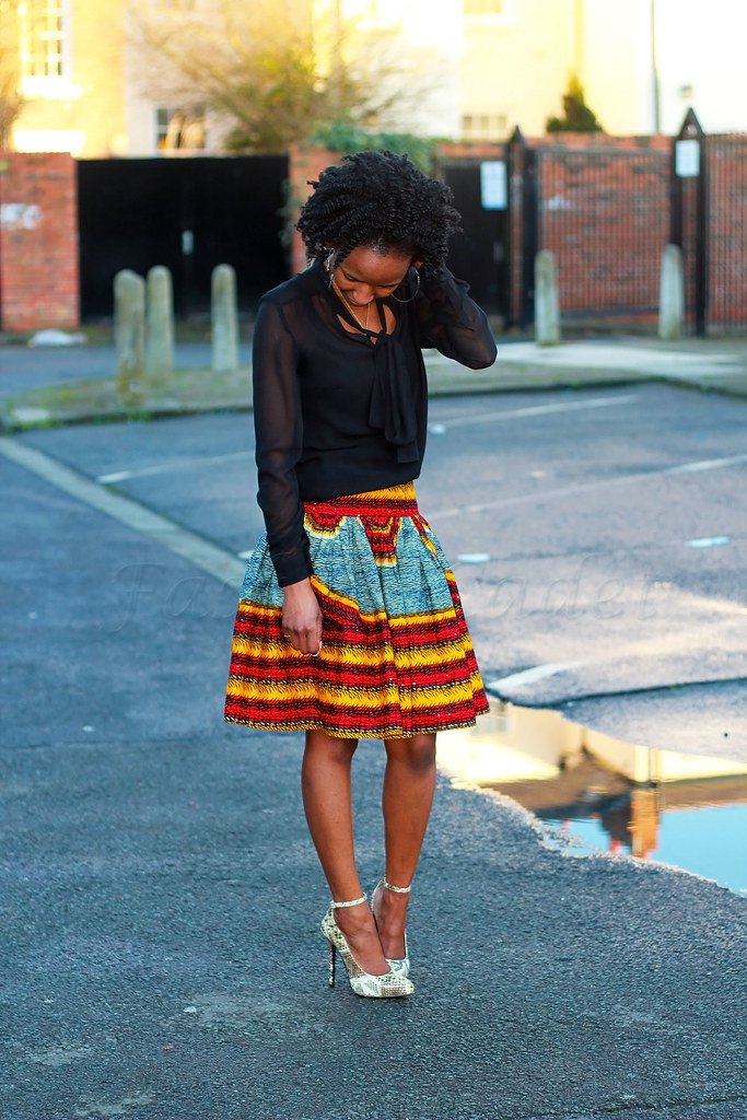 African print/ankara skater skirt with black sheer top & snakeskin ankle strap heels