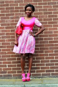 Wide neck pink 'ankara'/'kitenge'/African print skater dress with an oversized clutch: Date night outfit