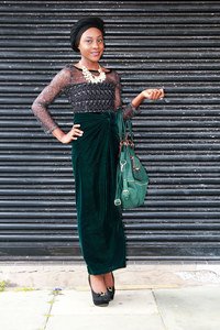 Velvet knot wrapper with a lace sequin top with a black head wrap, statement necklace & a green handbag- "Akpoche"